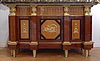 An extremely fine and rare Empire gilt bronze mounted mahogany, satinwood and ebony credenza attributed to Jacob-Desmalter et Cie with magnificent bronzes attributed to Pierre-Philippe Thomire